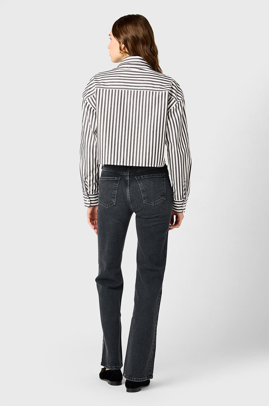 Model wearing the lady & the sailor Cropped Boxy Button up in Black Ivory Stripe.