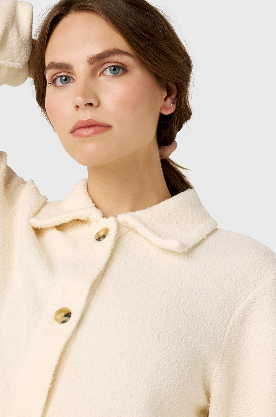 Model wearing The Lady & The Sailor Collared Cardi in Vanilla Bouclé.
