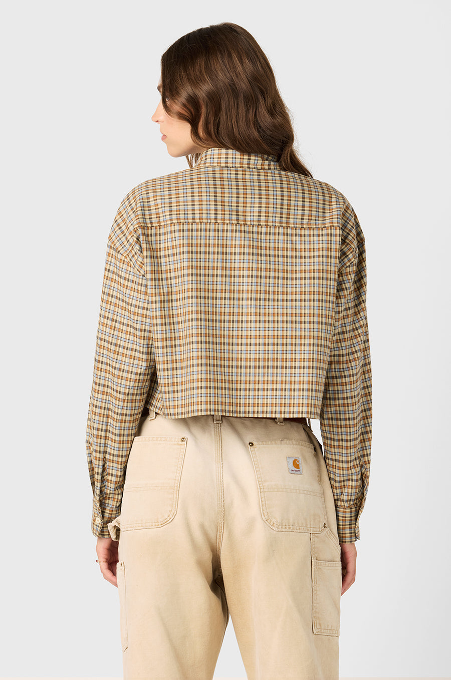 Model wearing The Lady & The Sailor Cropped Boxy Button Up in Ivory Plaid.