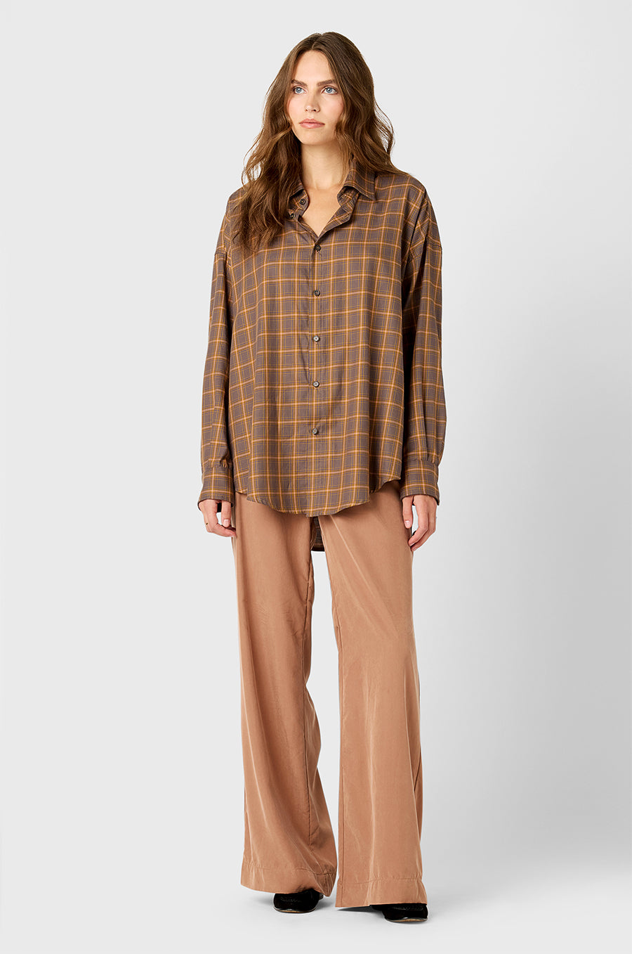 Model wearing The Lady & The Sailor Sunday Shirt in Dusk Plaid and Silky Wide Leg Pant in Washed Rosegold.
