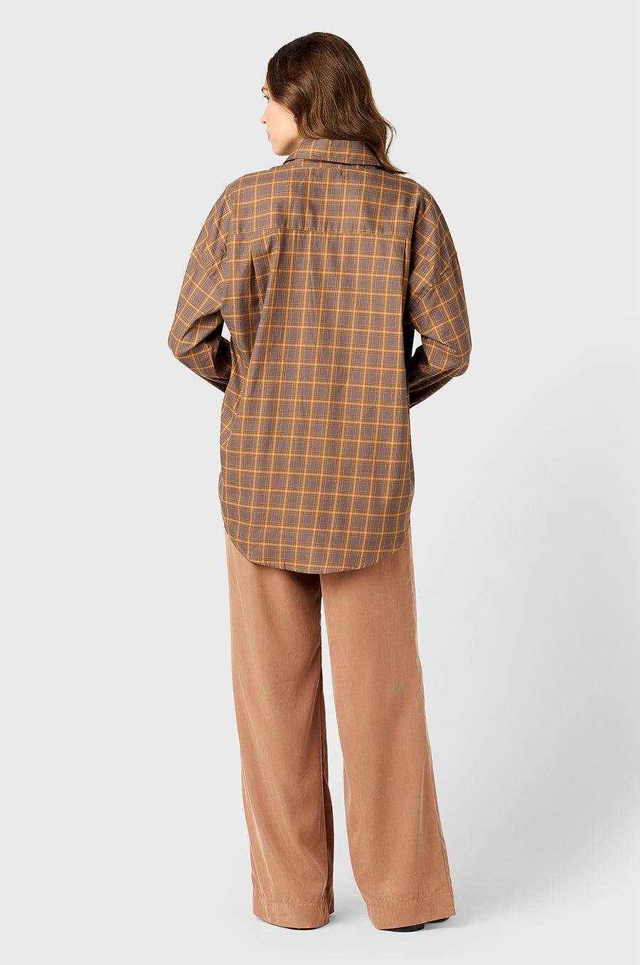 Model wearing The Lady & The Sailor Sunday Shirt in Dusk Plaid and Silky Wide Leg Pant in Washed Rosegold.