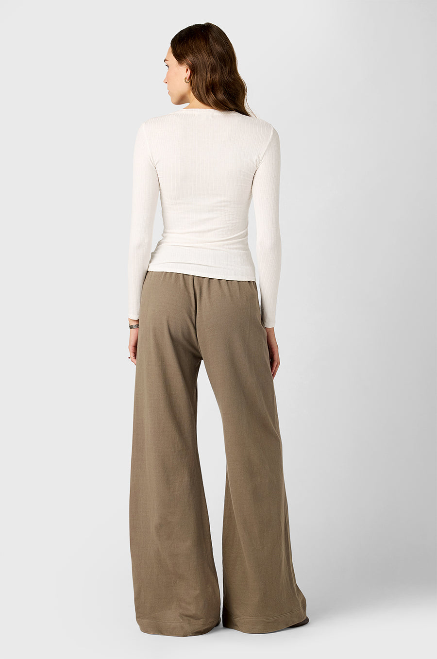 Model wearing the lady & the sailor's Pointelle Long Sleeve in Pearl & the Wide Leg Pant in Morel Cotton Twill.