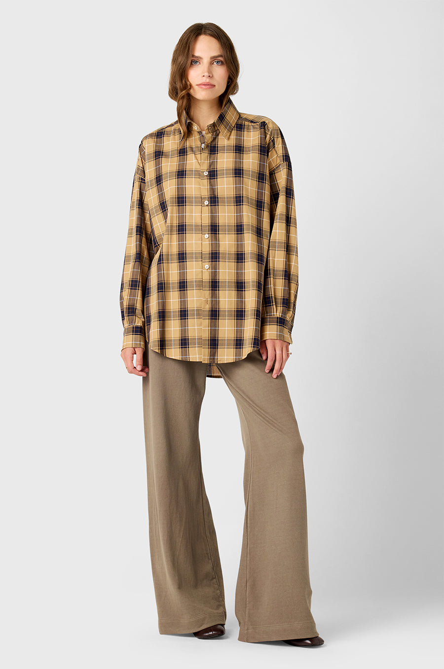 Model wearing The Lady & The Sailor Sunday Shirt in Camel Plaid and Wide Leg Pant in Morel.