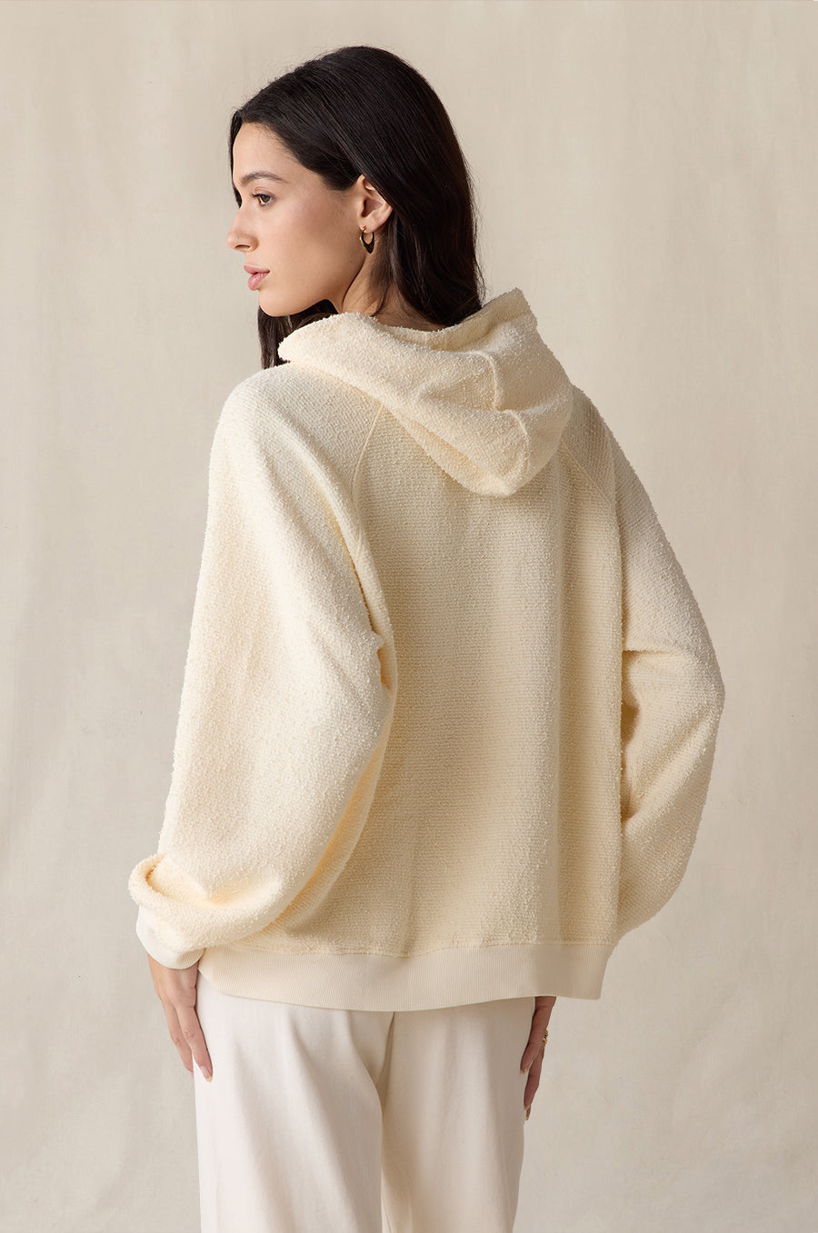 Tomboy Hoodie in crème bouclé styled with the French Flare Pant in vanilla - the lady & the sailor