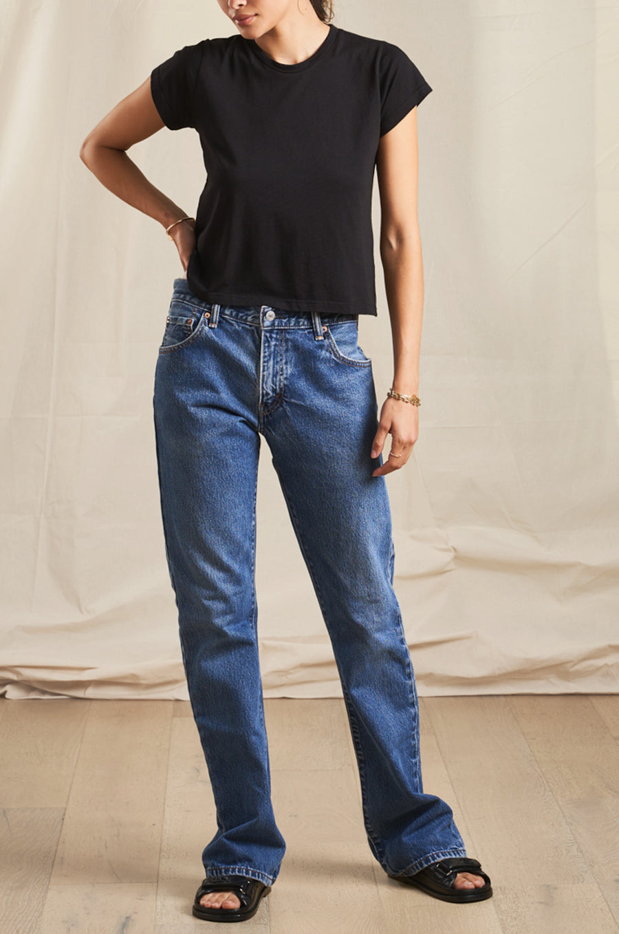 Model wearing the lady & the sailor Shrunken BF tee in black luxe cotton.