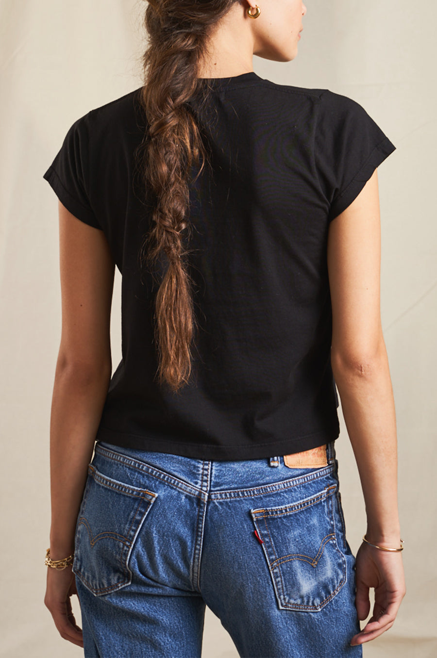 Model wearing the lady & the sailor Shrunken BF tee in black luxe cotton.