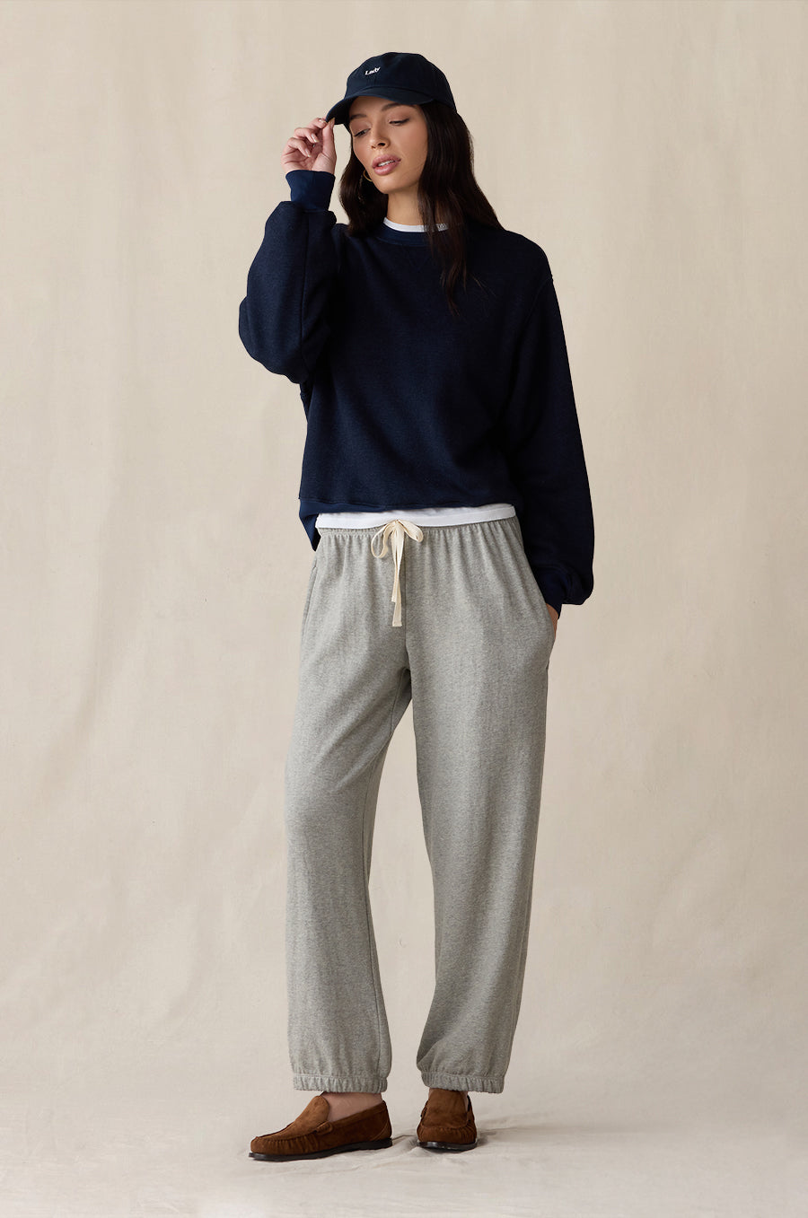 Relaxed Fleece Sweatshirt in indigo, styled with the Relaxed Pocket Sweatpant in heather grey terry, Shrunken BF Tee in white and Lady Classic Cap in navy - the lady & the sailor