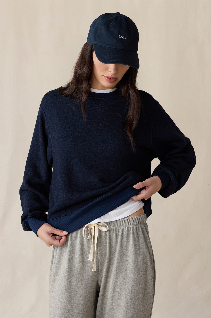 Relaxed Fleece Sweatshirt in indigo, styled with the Relaxed Pocket Sweatpant in heather grey terry, Shrunken BF Tee in white and Lady Classic Cap in navy - the lady & the sailor