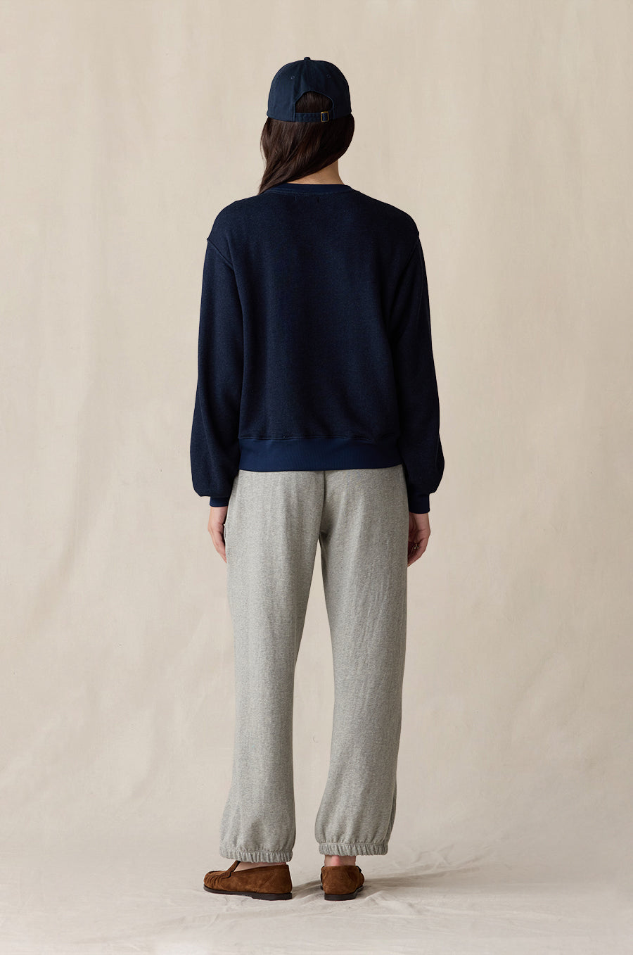 Relaxed Fleece Sweatshirt in indigo, styled with the Relaxed Pocket Sweatpant in heather grey terry, Shrunken BF Tee in white and Lady Classic Cap in navy - the lady & the sailor