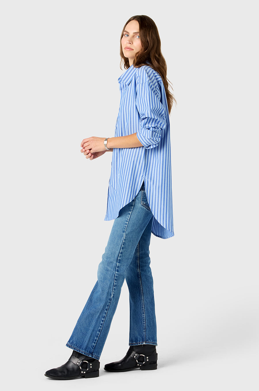 Model wearing The Lady & The Sailor Curved Hem Button up in French Blue Stripe.
