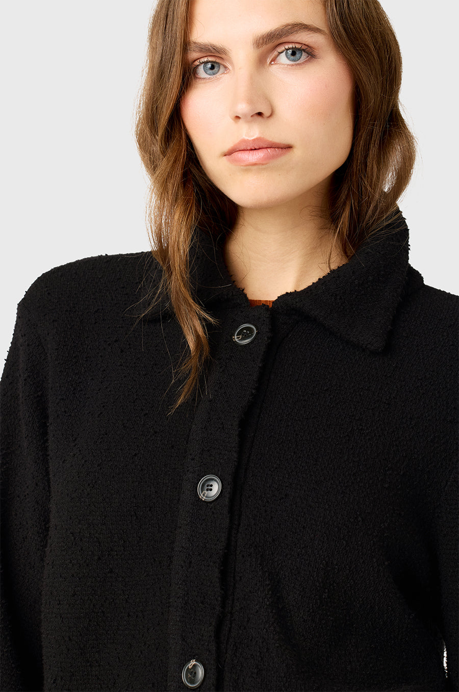 Model wearing The Lady & The Sailor Collared Cardi in Black Bouclé.