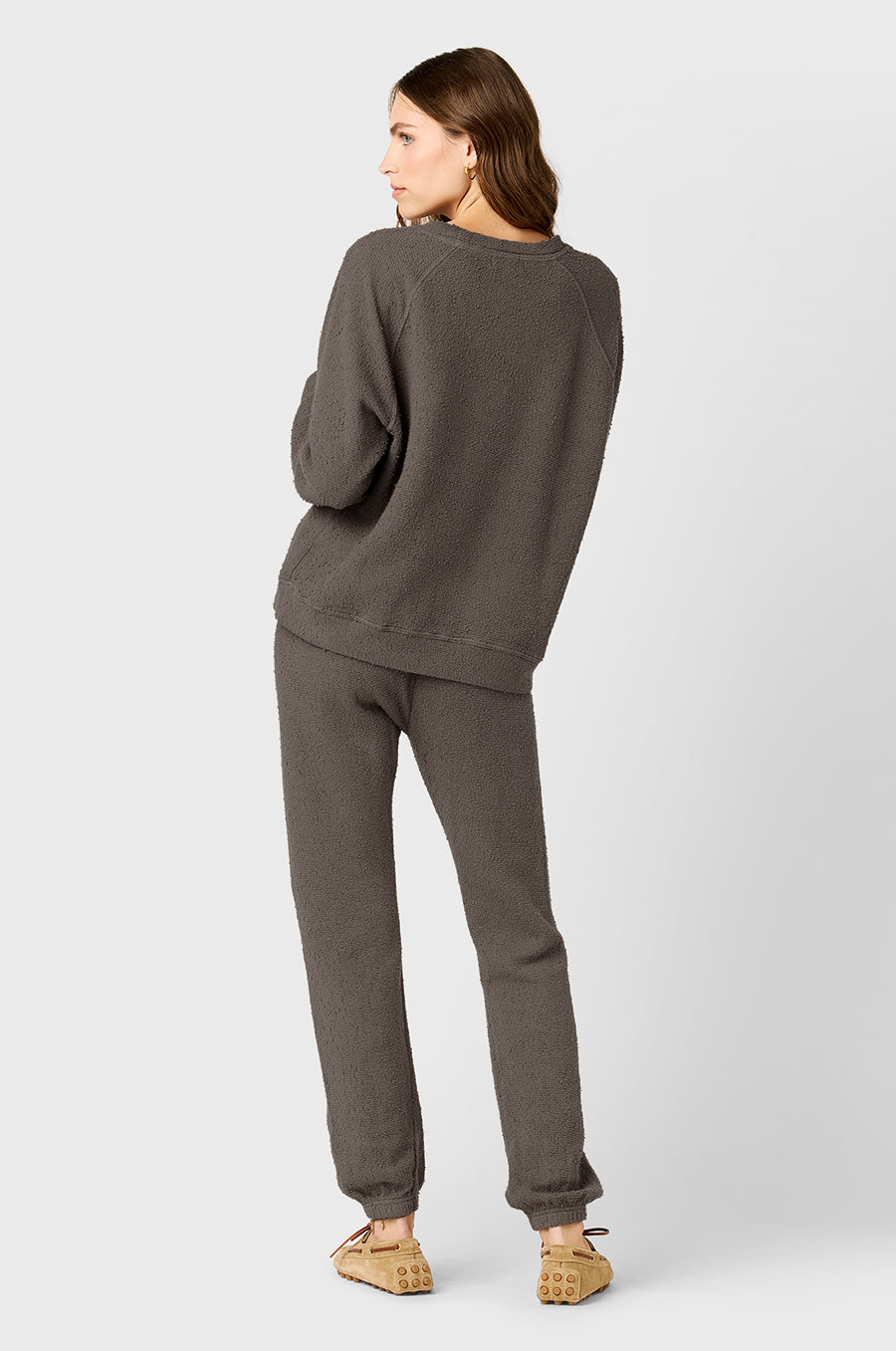 Model wearing The Lady & The Sailor Brentwood Sweatshirt in Thunder Bouclé and the Full Length Vintage Sweatpant in Thunder Bouclé.