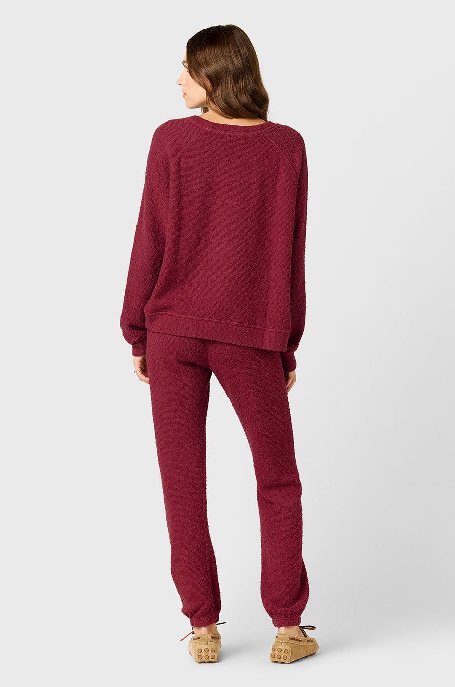 Model wearing The Lady & The Sailor Brentwood Sweatshirt in Ruby Bouclé and the Full Length Vintage Sweatpant in Ruby Bouclé.