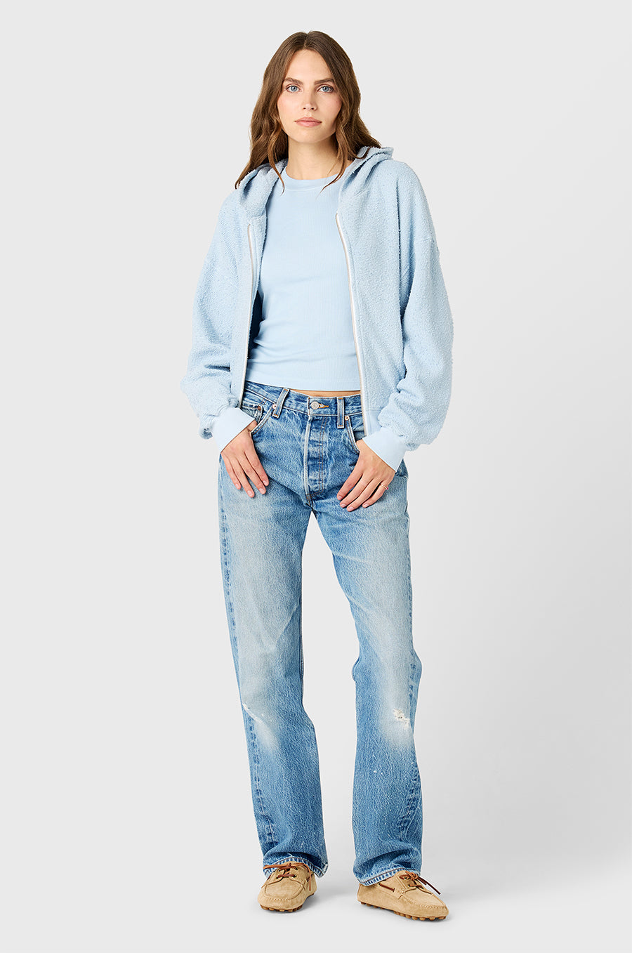 Model wearing the lady & the sailor Long Sleeve Classic Tee in Powdery Blue Classic Rib and Zip Up Hoodie in Powdery Blue Bouclé.