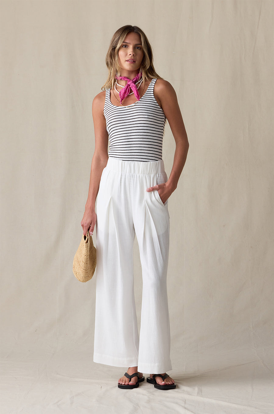 LAYER TANK IN BLACK/WHITE STRIPE STYLED WITH THE ANKLE PLEATED TROUSER IN IVORY AND THE NAOMI BAG IN NATURAL- the lady & the sailor