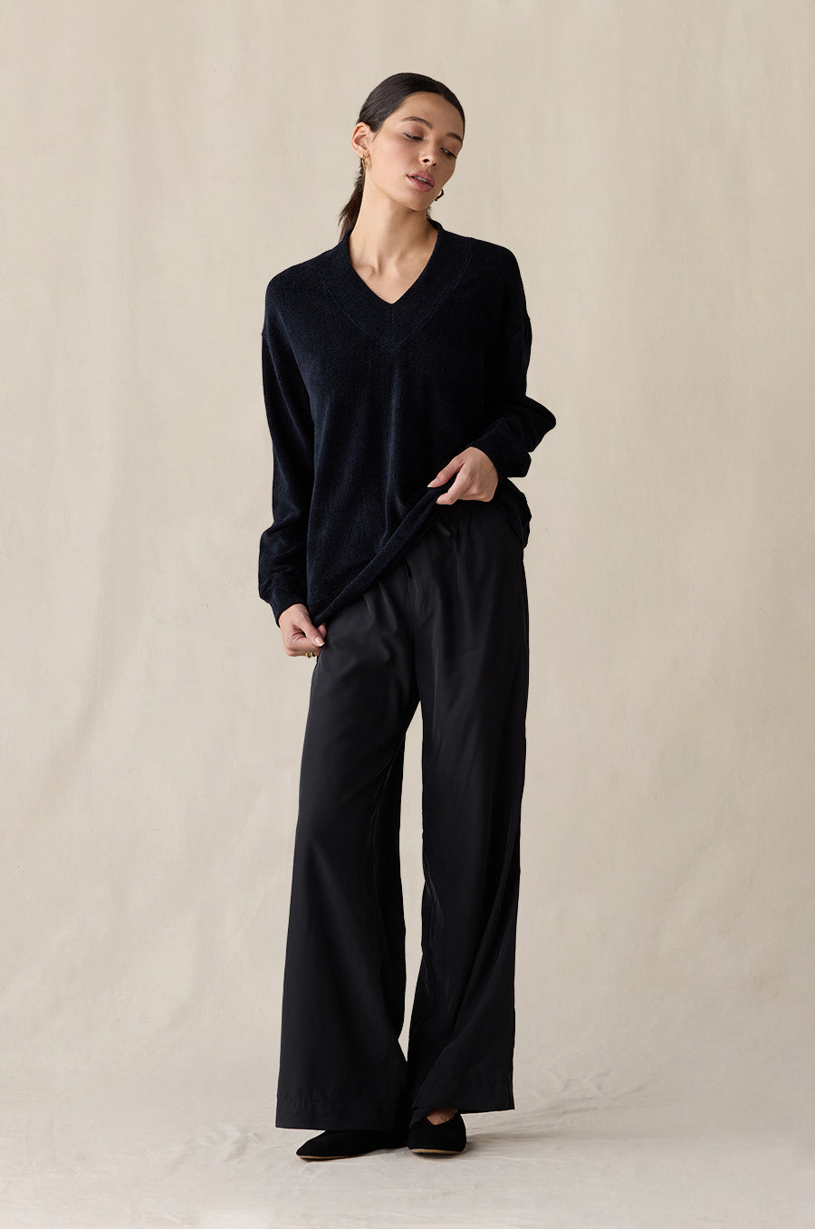 Silky Wide Leg Pant in washed black styled with the Relaxed V-Neck Pullover in midnight chenille - the lady & the sailor