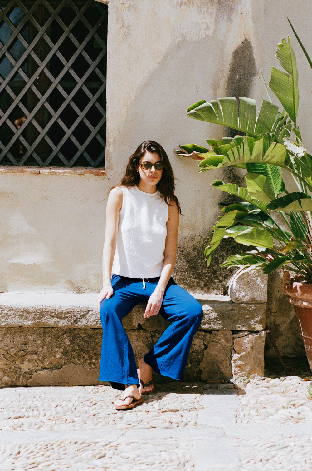 the crewneck tank in white boucle styled with the french flare in true blue organic cotton - the lady & the sailor