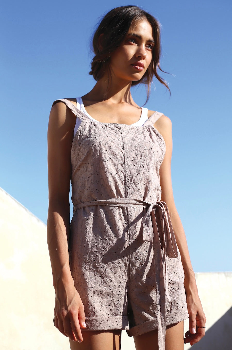 THE BEACH PLAYSUIT IN BLACK EYELET