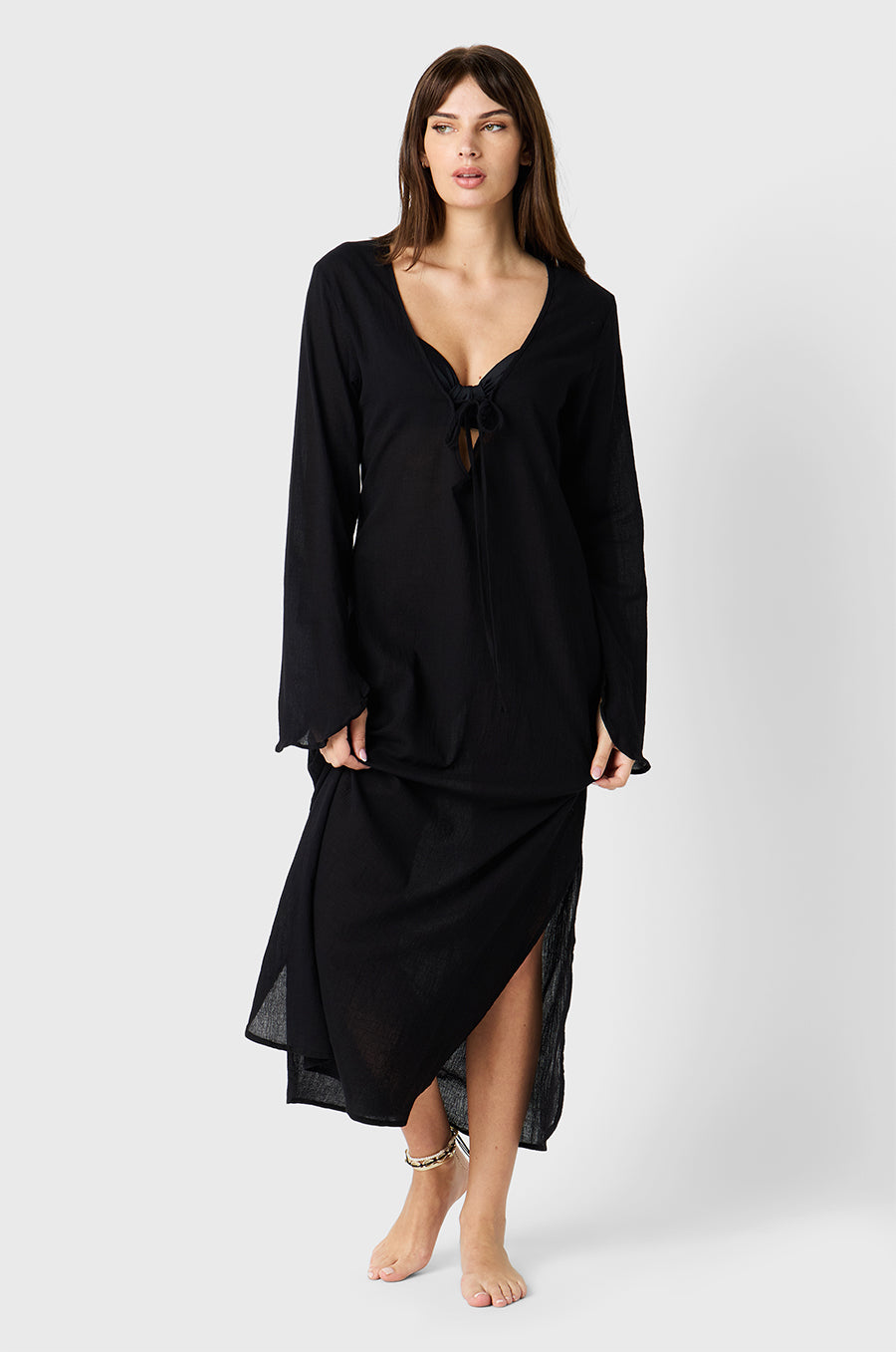 Brunette Model wearing the lady & the sailor Mia Dress in Black Cotton Voile