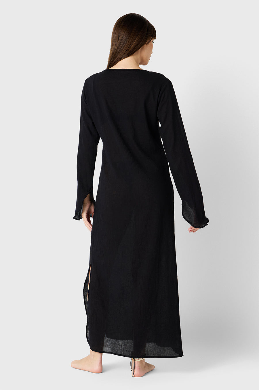 Brunette Model wearing the lady & the sailor Mia Dress in Black Cotton Voile