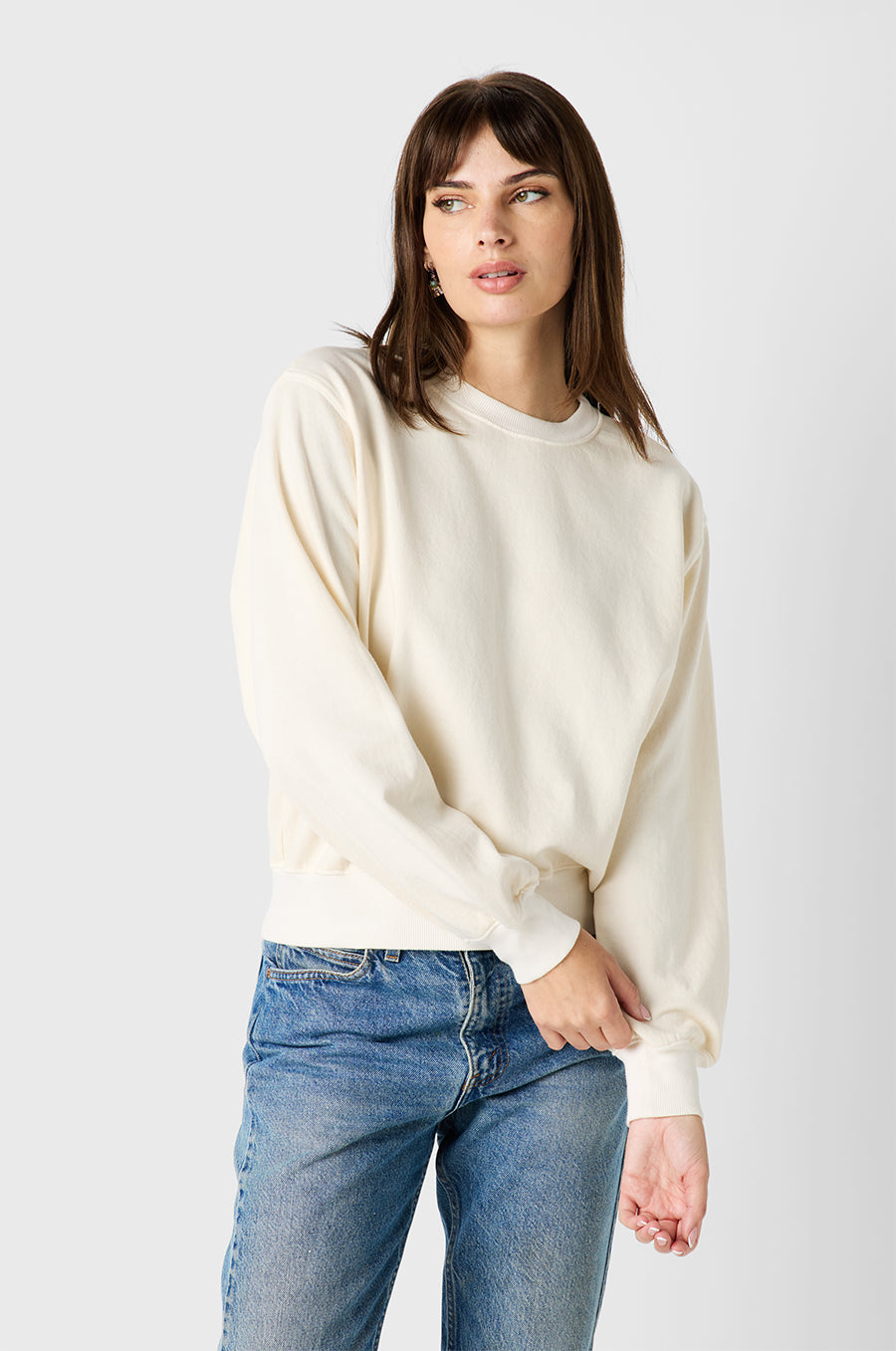 Brunette Model wearing the lady & the sailor Relaxed Sweatshirt in Vanilla Organic Cotton