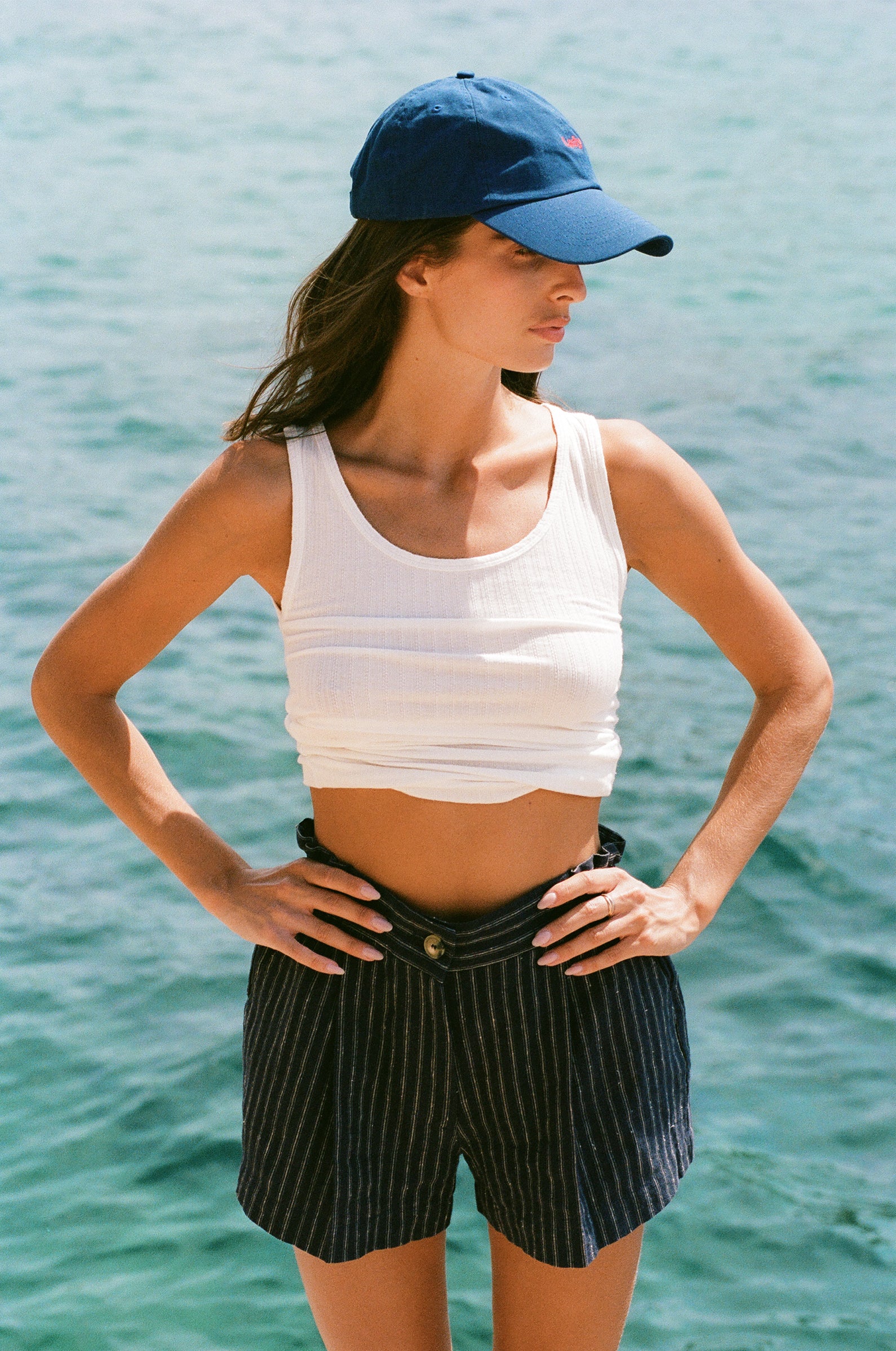 THE LADY CLASSIC CAP IN ROYAL/TOMATO STYLED WITH THE SEASIDE SHORT IN MARINE STRIPE AND THE POINTELLE TANK IN PEARL - the lady & the sailor