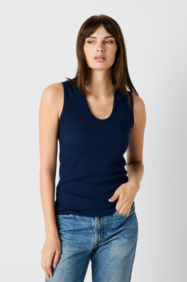Brunette Model wearing the lady & the sailor Scoop Neck Tank in Navy Classic Rib