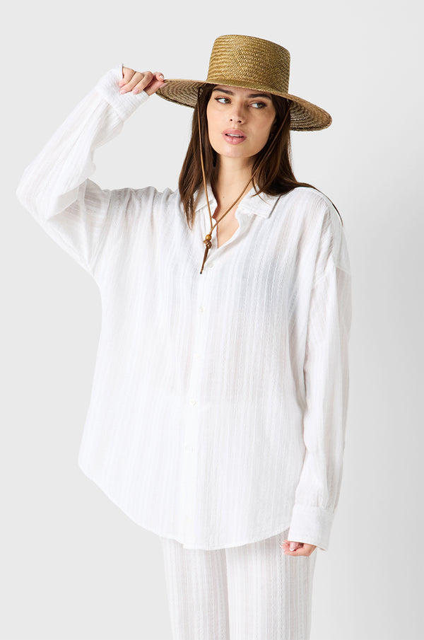  Brunette Model wearing the lady & the sailor Sunday Shirt in White Beach Stripe
