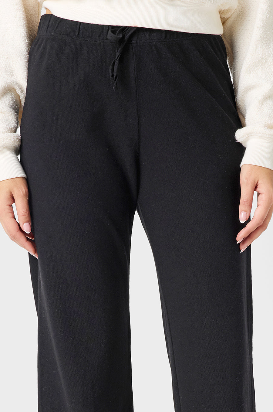 Model wearing The Lady & The Sailor Pocket Straight Leg Pant in Black Cotton Twill.