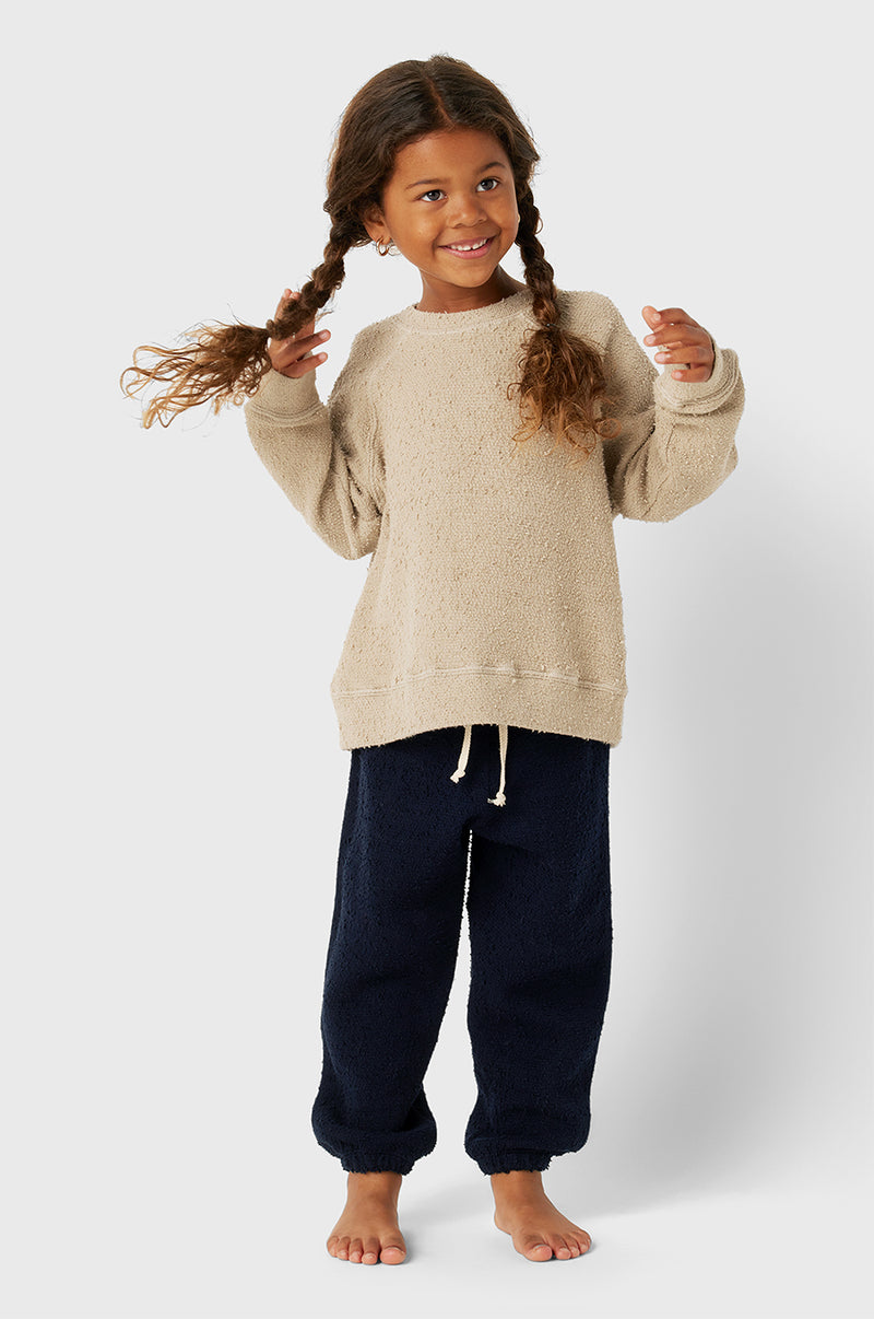 Model wearing Kids Vintage Sweatpants in Navy Bouclé little lady & petit sailor