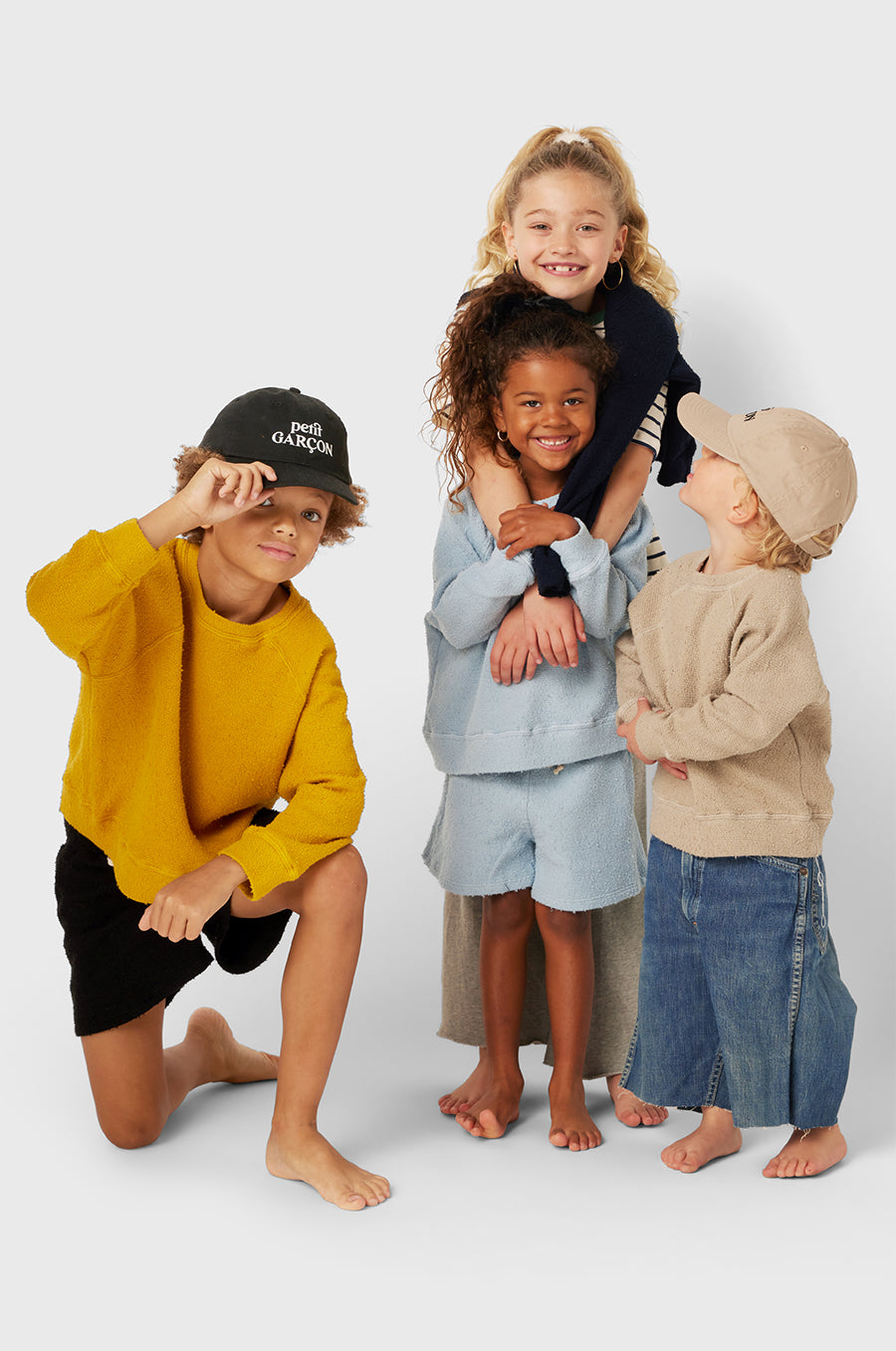 Model wearing Kids Weekend Short in Black Bouclé little lady & petit sailor