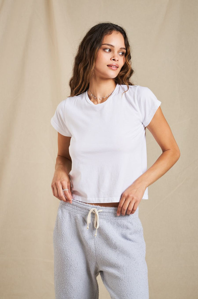 Brunette Model wearing the lady & the sailor Shrunken BF Tee in White Luxe Cotton.
