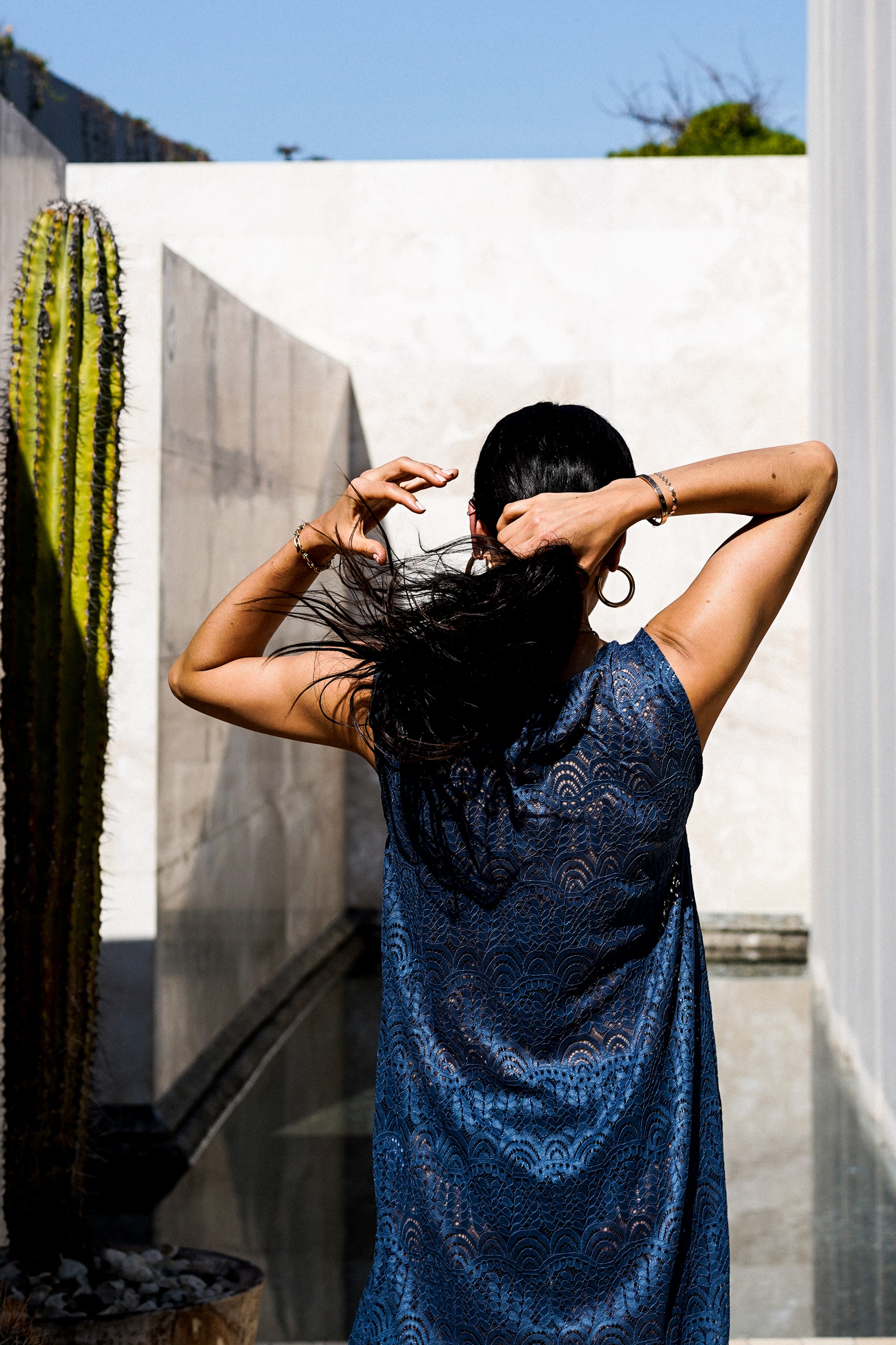 Model wearing the lady & the sailor Long Shift Tunic in indigo lace.