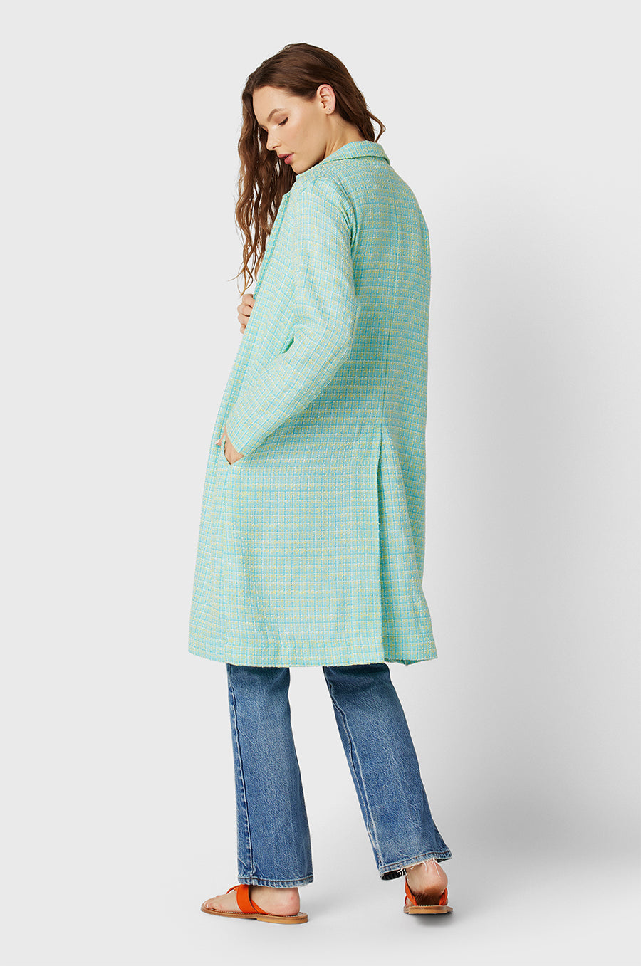 Brunette Model wearing the lady & the sailor Midi Blazer in Aqua Tweed.