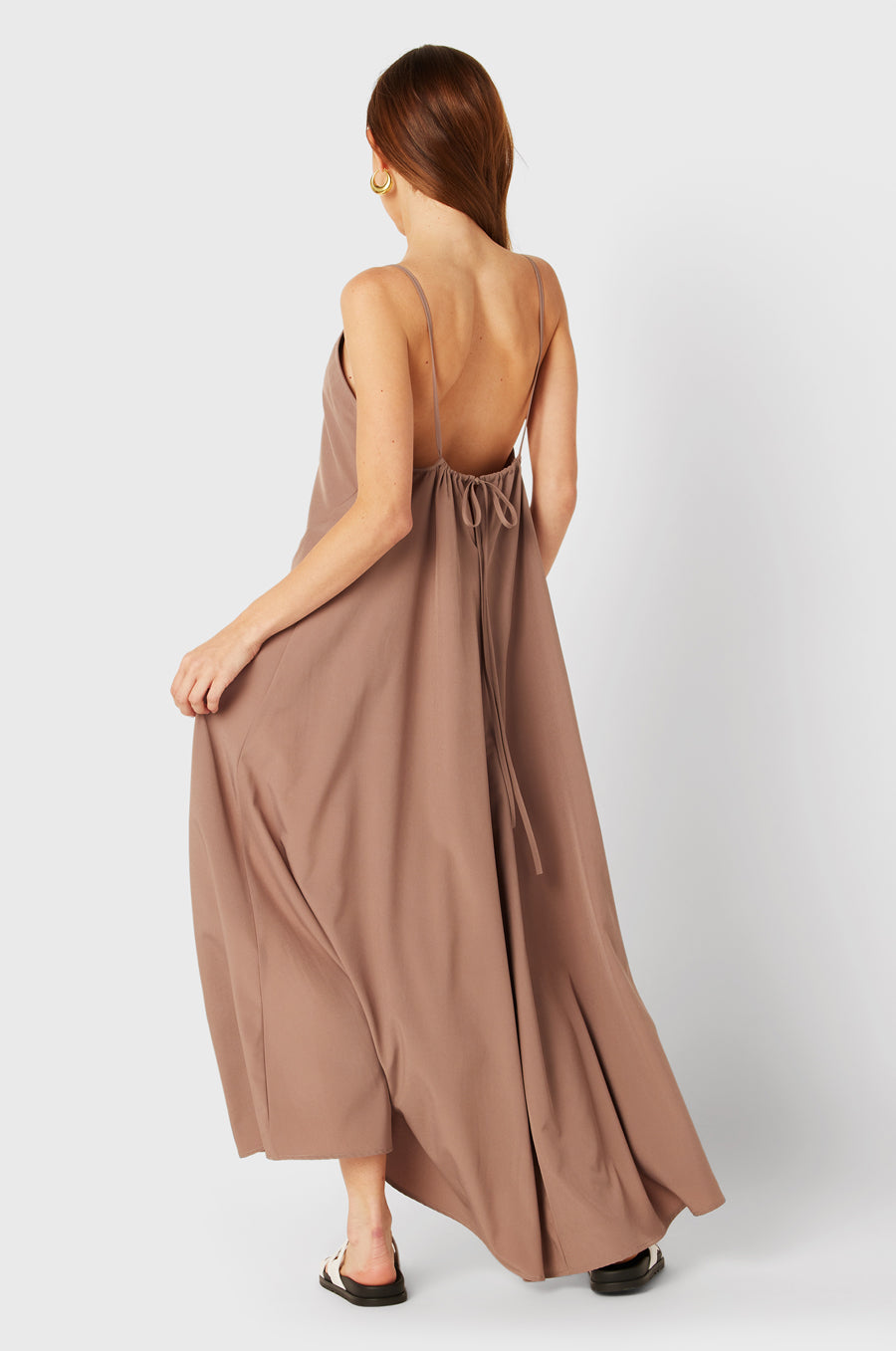 Brunette Model wearing the lady & the sailor Chloe Dress in Dusk.