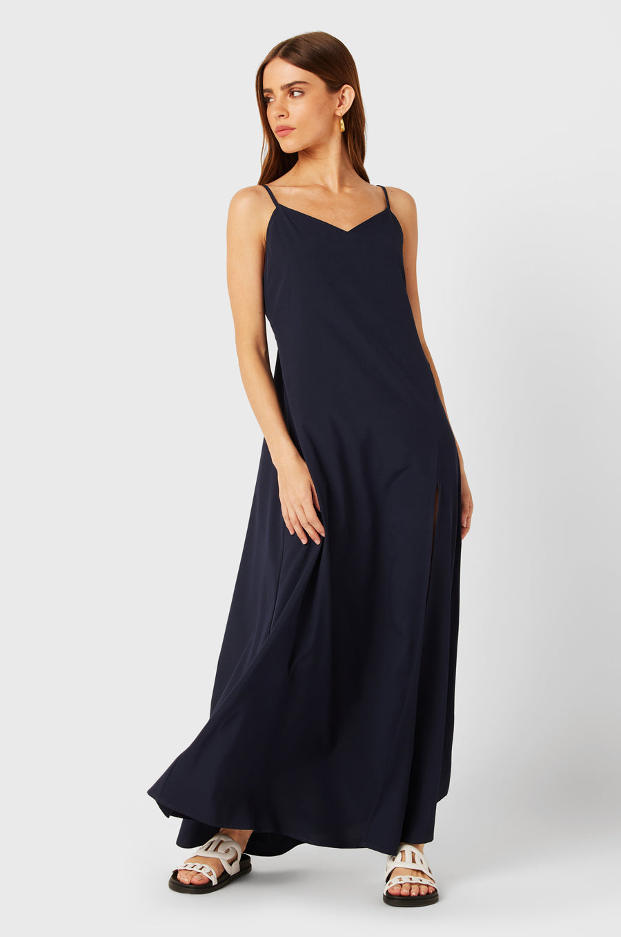 Brunette Model wearing the lady & the sailor Chloe Dress in Navy.