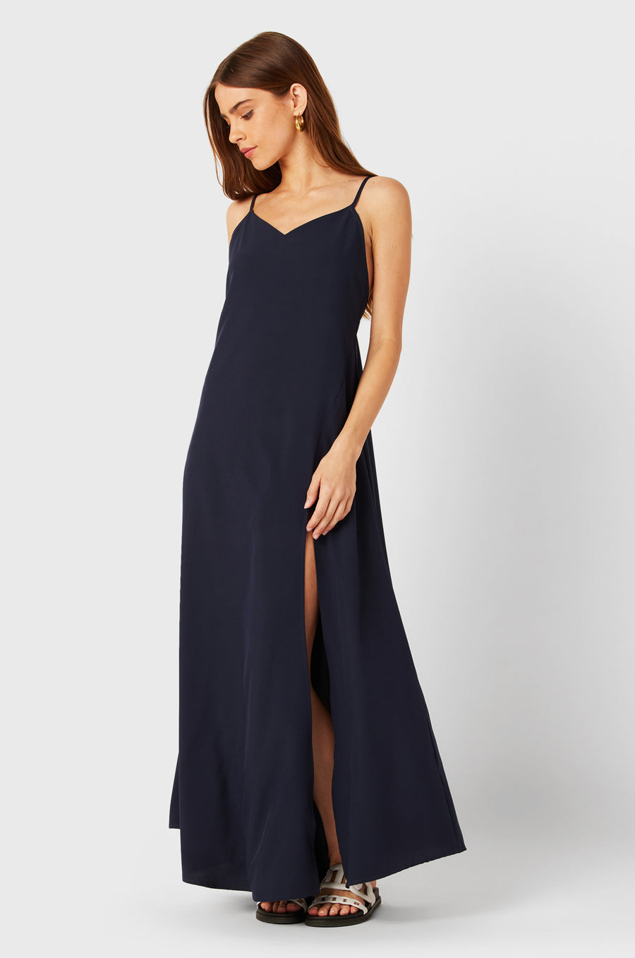 Brunette Model wearing the lady & the sailor Chloe Dress in Navy.