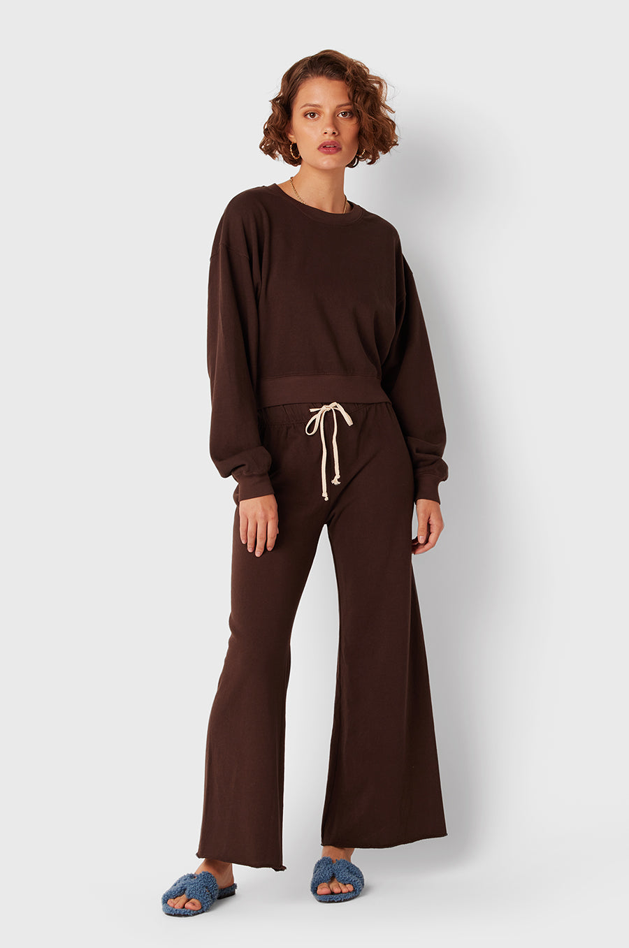Brunette Model wearing the lady & the sailor French Flare Pant in Chocolate Organic Cotton.