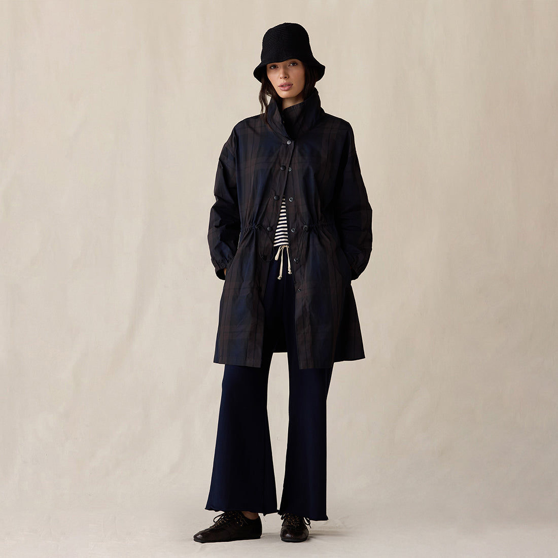 Brunette model wearing The Sunday Shirt in Navy Pinstripe