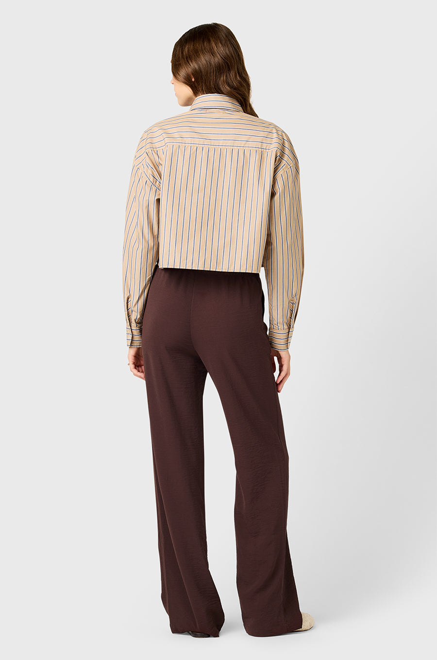 Model wearing the lady & the sailor High Waisted  Drawstring Pant in Chocolate Air Flow.