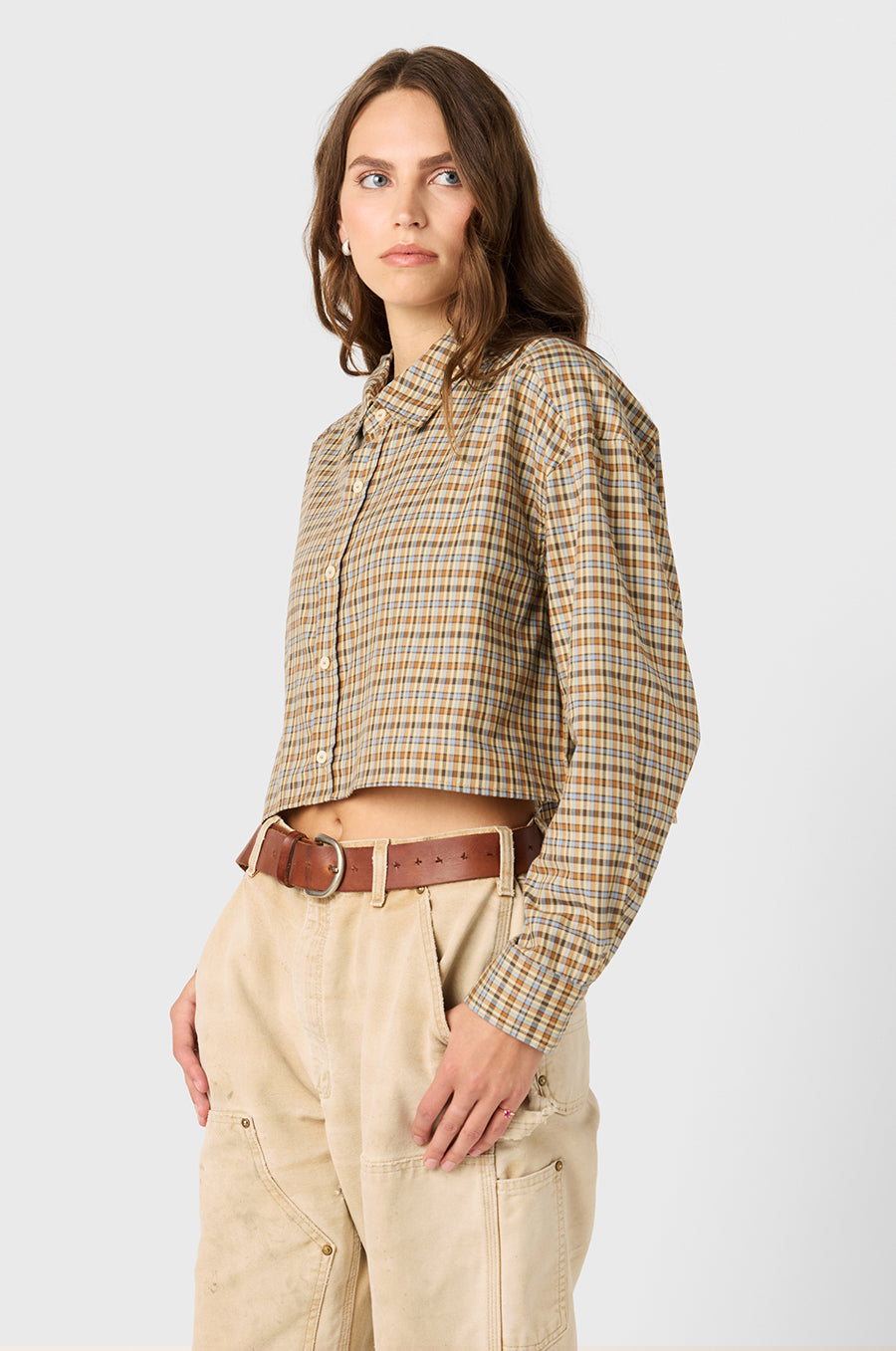 Model wearing The Lady & The Sailor Cropped Boxy Button Up in Ivory Plaid.