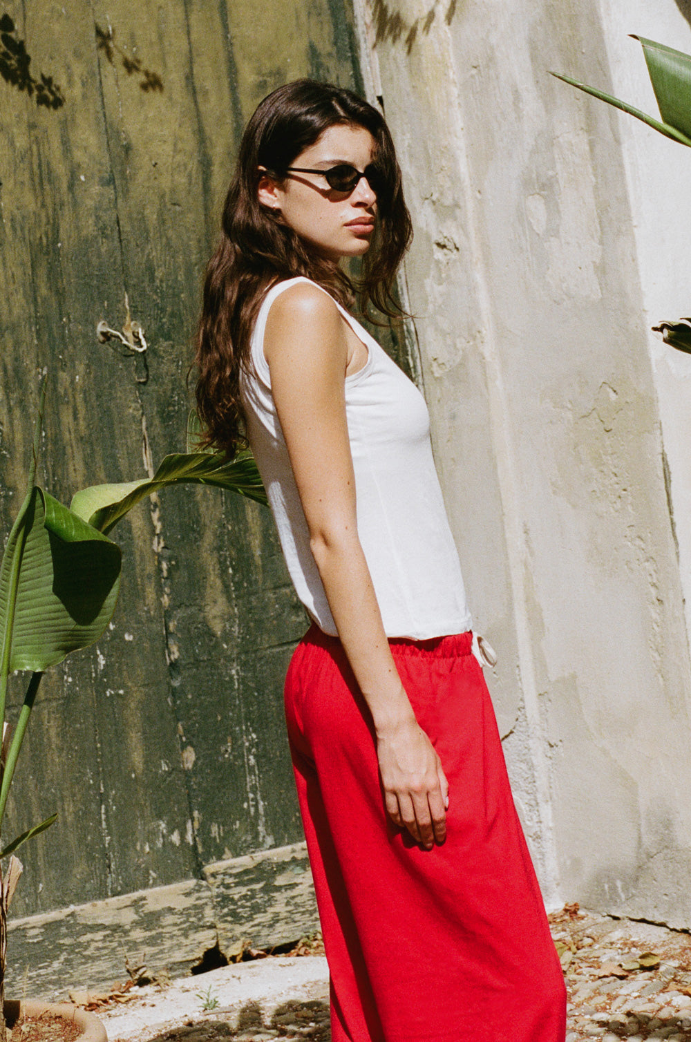 the relaxed sweatpant in red jersey styled with the feather scoop tank in white sheer cotton - the lady & the sailor