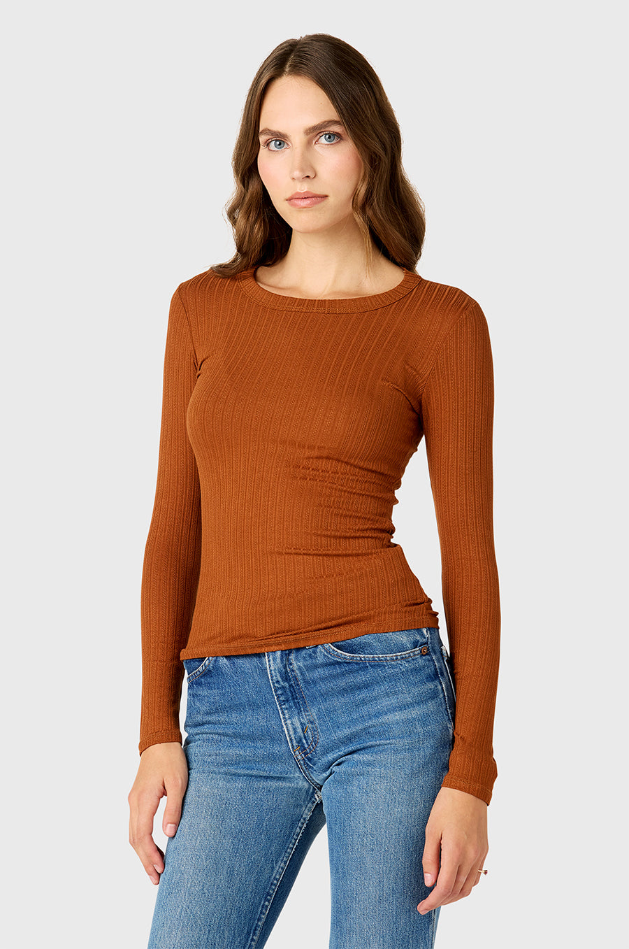 Model wearing the lady & the sailor's Pointelle Long Sleeve in Bronze.