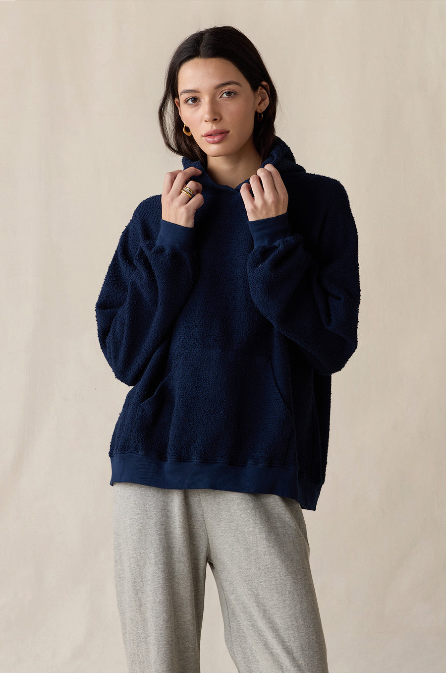 Tomboy Hoodie in indigo bouclé styled with the French Flare Pant in heather grey - the lady & the sailor