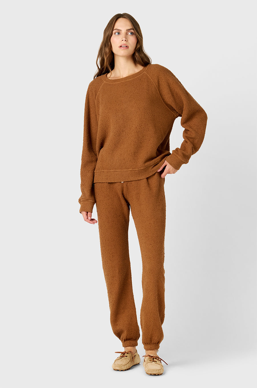 Model wearing the lady & the sailor's Full Lenght Vintage Sweatpant in Praline Bouclé.