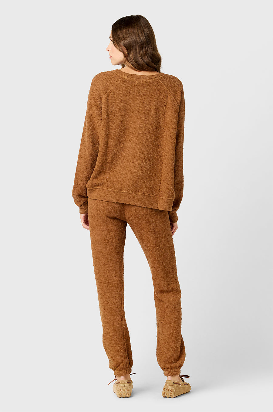 Model wearing the lady & the sailor's Brentwood Sweatshirt in Praline Bouclé.