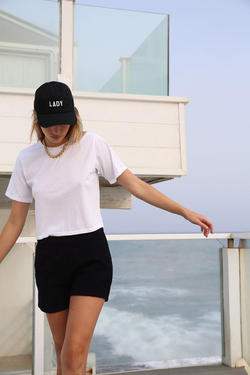 Model wearing the lady & the sailor SS Classic Tee in Black.