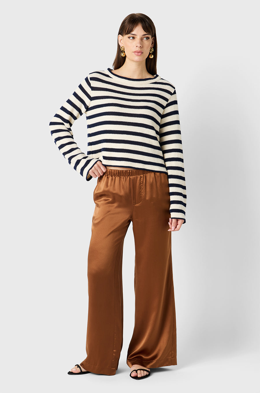 Brunette model wearing the lady & the sailor Wide Leg Pant in Toffee Silk