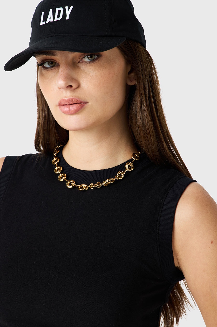 Brunette Model wearing the lady & the sailor Crewneck Tank in Black Organic Cotton Jersey