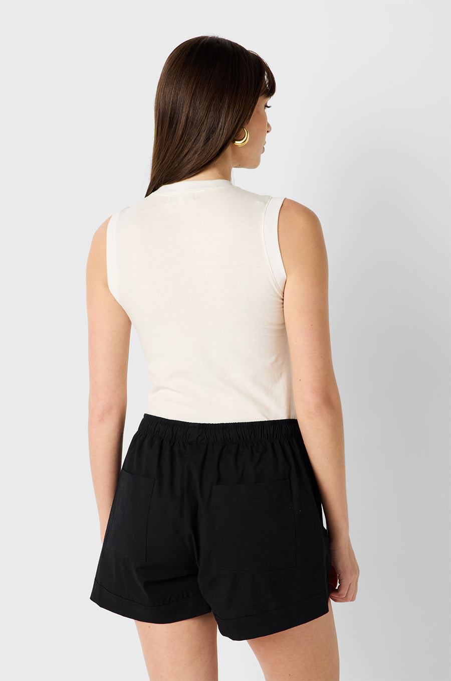 Brunette Model wearing the lady & the sailor Cuffed Short in Black Poplin